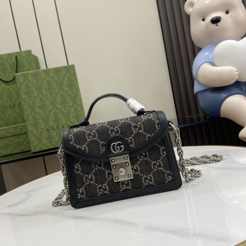 G*u*i top handle bags